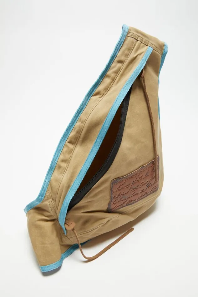 Acne Studios Sling Backpack Beigeblue Man Bags