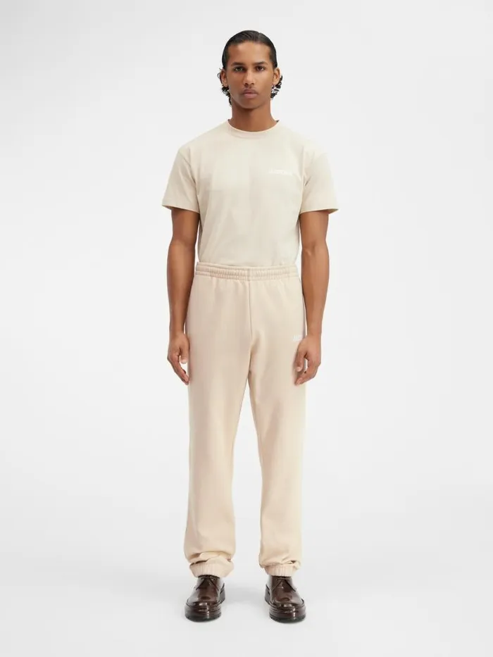 The Jacquemus Track Pants Light Beige WomenMen JACQUEMUS Sweatshirts and Joggings The Jacquemus Track Pants Light Beige WomenMen JACQUEMUS Sweatshirts and Joggings