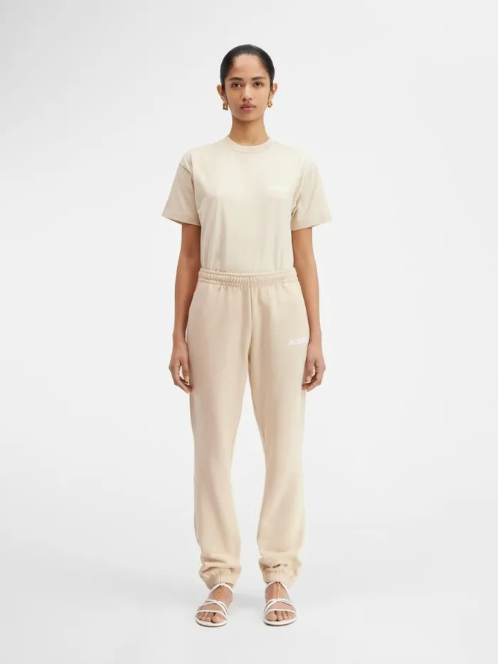 The Jacquemus Track Pants Light Beige WomenMen JACQUEMUS Sweatshirts and Joggings The Jacquemus Track Pants Light Beige WomenMen JACQUEMUS Sweatshirts and Joggings