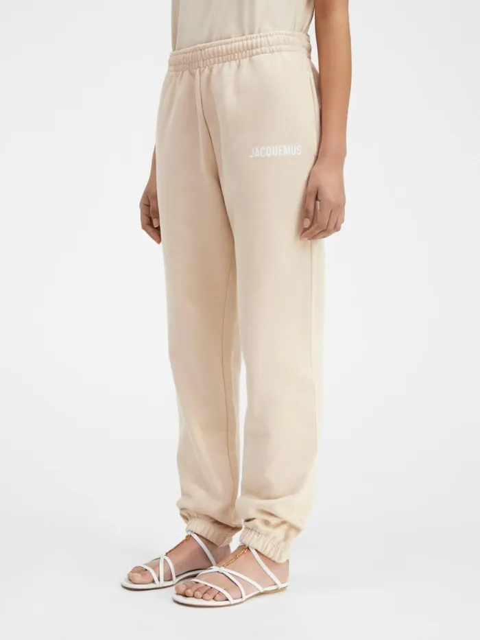 The Jacquemus Track Pants Light Beige WomenMen JACQUEMUS Sweatshirts and Joggings The Jacquemus Track Pants Light Beige WomenMen JACQUEMUS Sweatshirts and Joggings